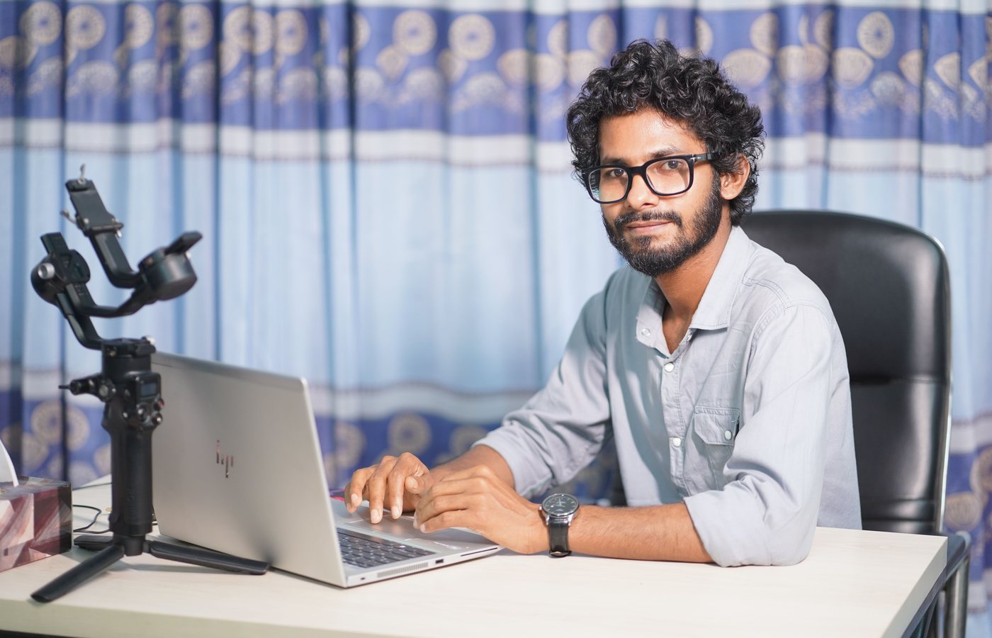 Web developer working at a modern desk